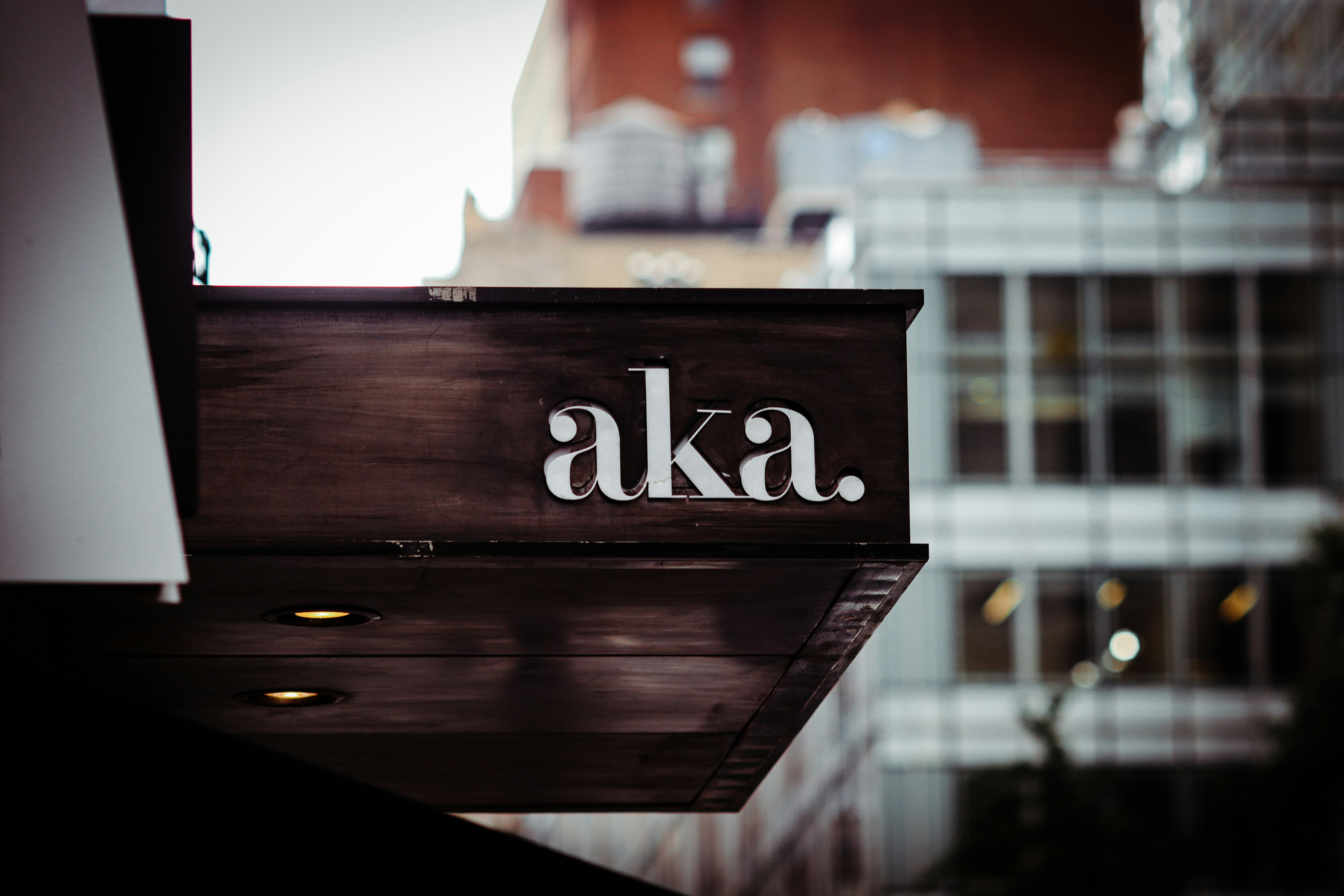 a close up of a sign on the side of a building